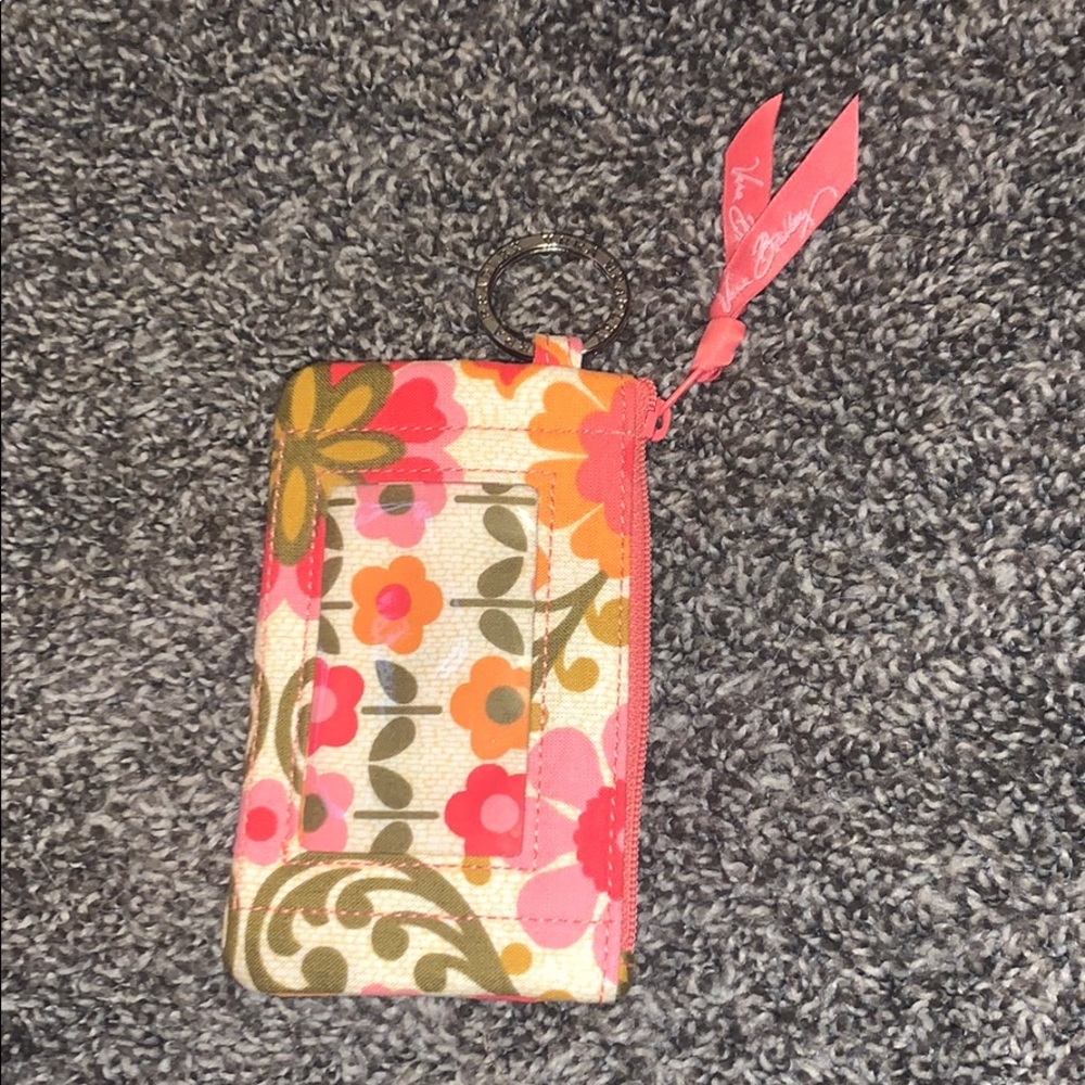 Floral Vera Bradley lanyard wallet attachment.